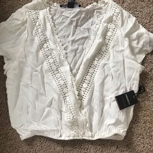 Low cut lace crop top